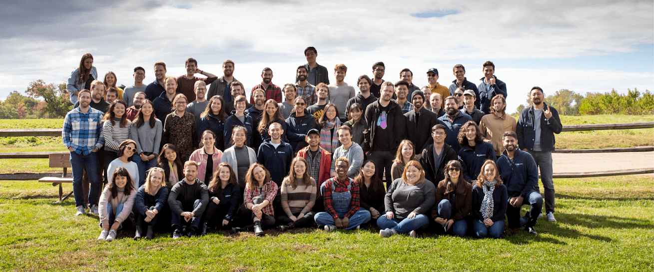 Codecademy team offsite group photo, roughly 60 people outdoors on a sunny day, circa 2018